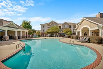 Zero-entry swimming pool with resort lounging